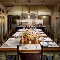 Student cooking crab in a pot