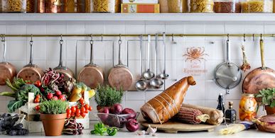 Kitchen area with study and display cases of wine
